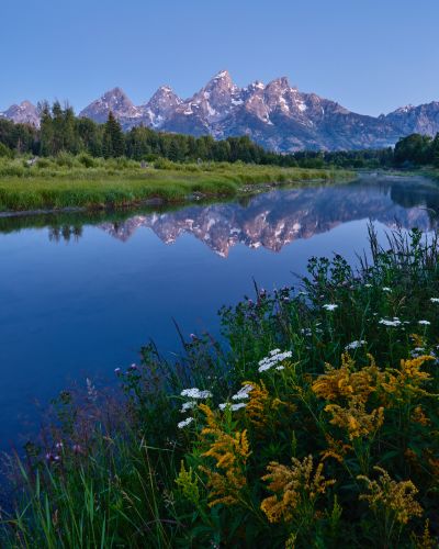 Grand Teton landscape photograph shot at f/16 showing deep depth of field with foreground and distant mountains both in sharp focus