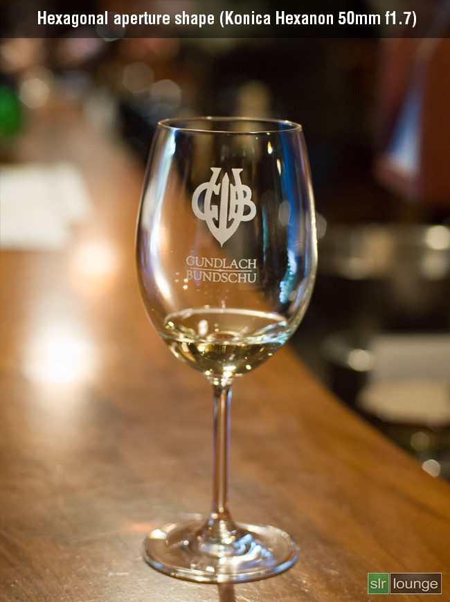 Example of bad bokeh showing hexagonal shaped out of focus highlight discs with harsh edges from a lens with straight aperture blades
