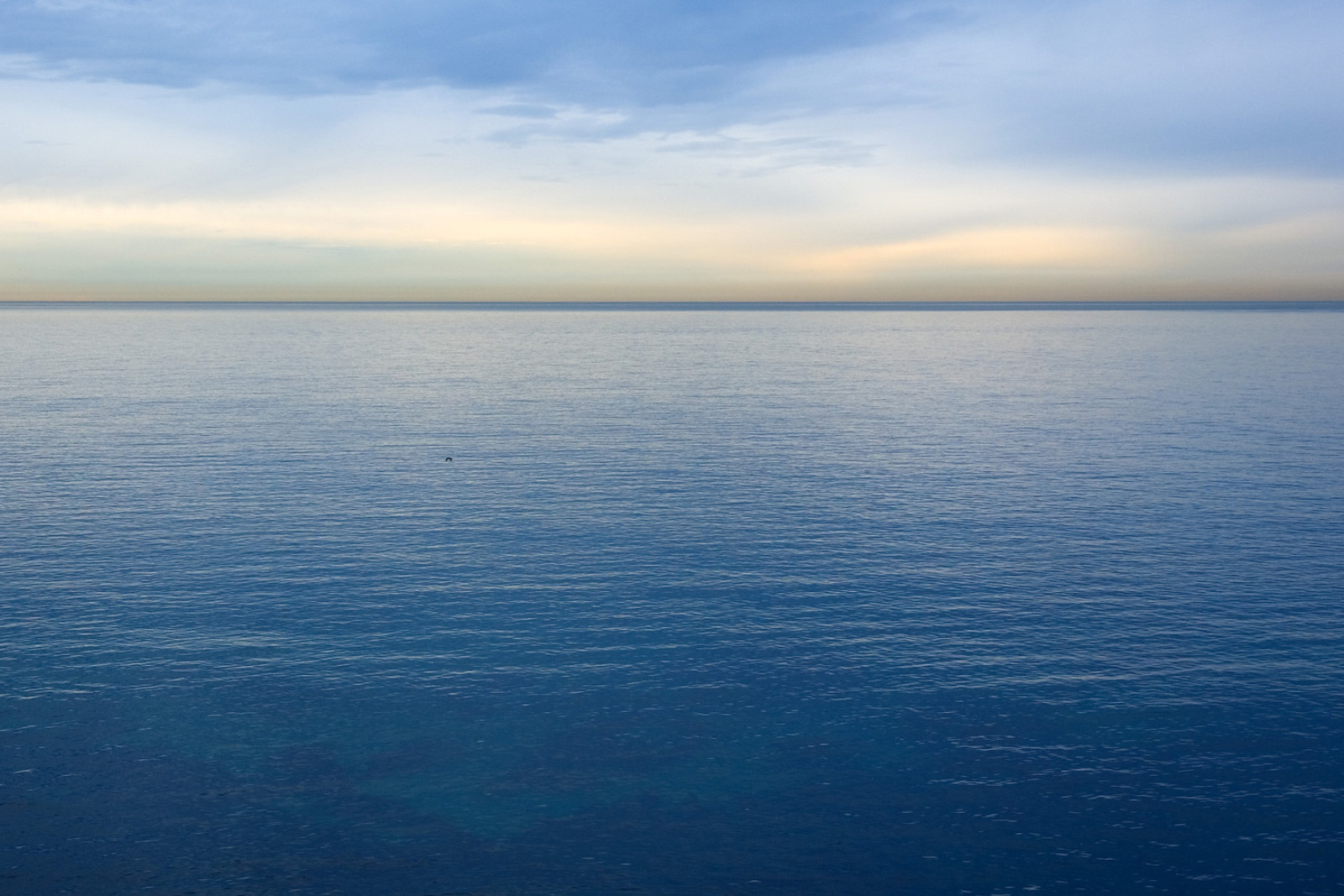 Landscape with horizon on lower rule of thirds line emphasizing sky and empty space above