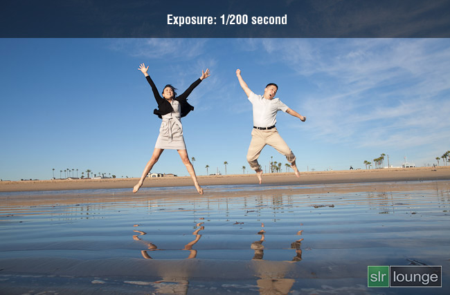Photograph shot at 1/200 sec freezing a jumping subject in mid-air with no motion blur