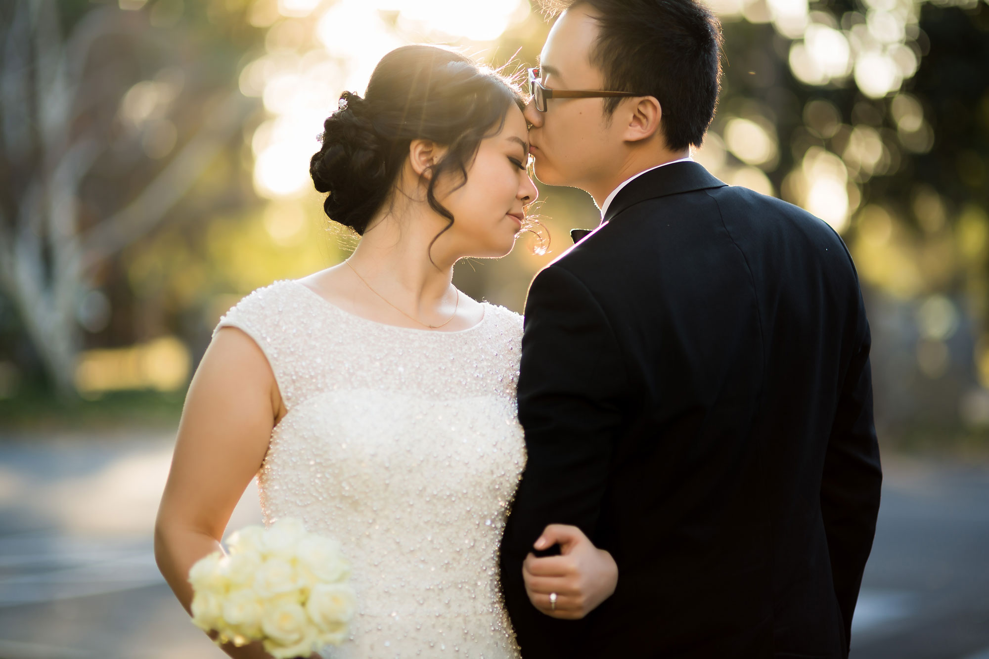 Portrait photograph demonstrating smooth creamy bokeh with a sharp subject against a softly blurred out of focus background