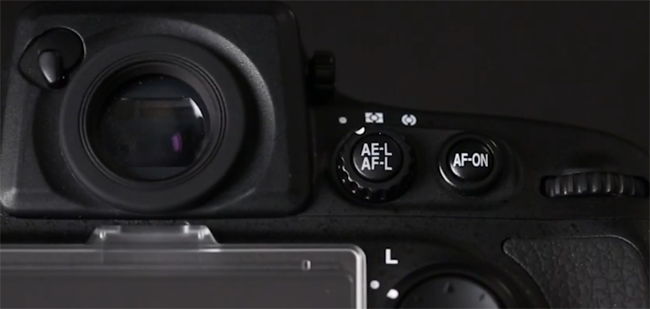 Nikon D800 metering dial showing the Spot metering mode icon selected with the white reference tab